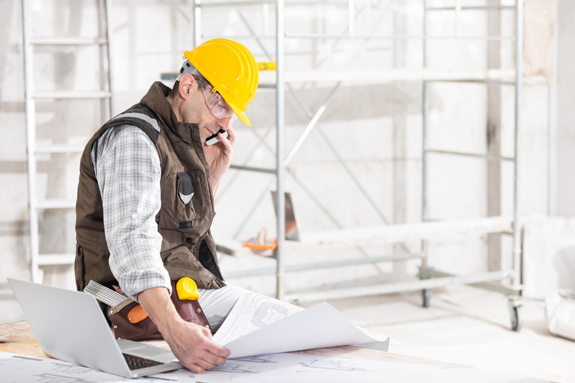 Building contractor talking on a mobile phone